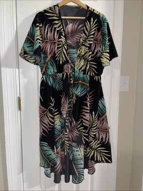 Lioness Curve Black Swimsuit Coverup with Green and Pink Tropical Leaves